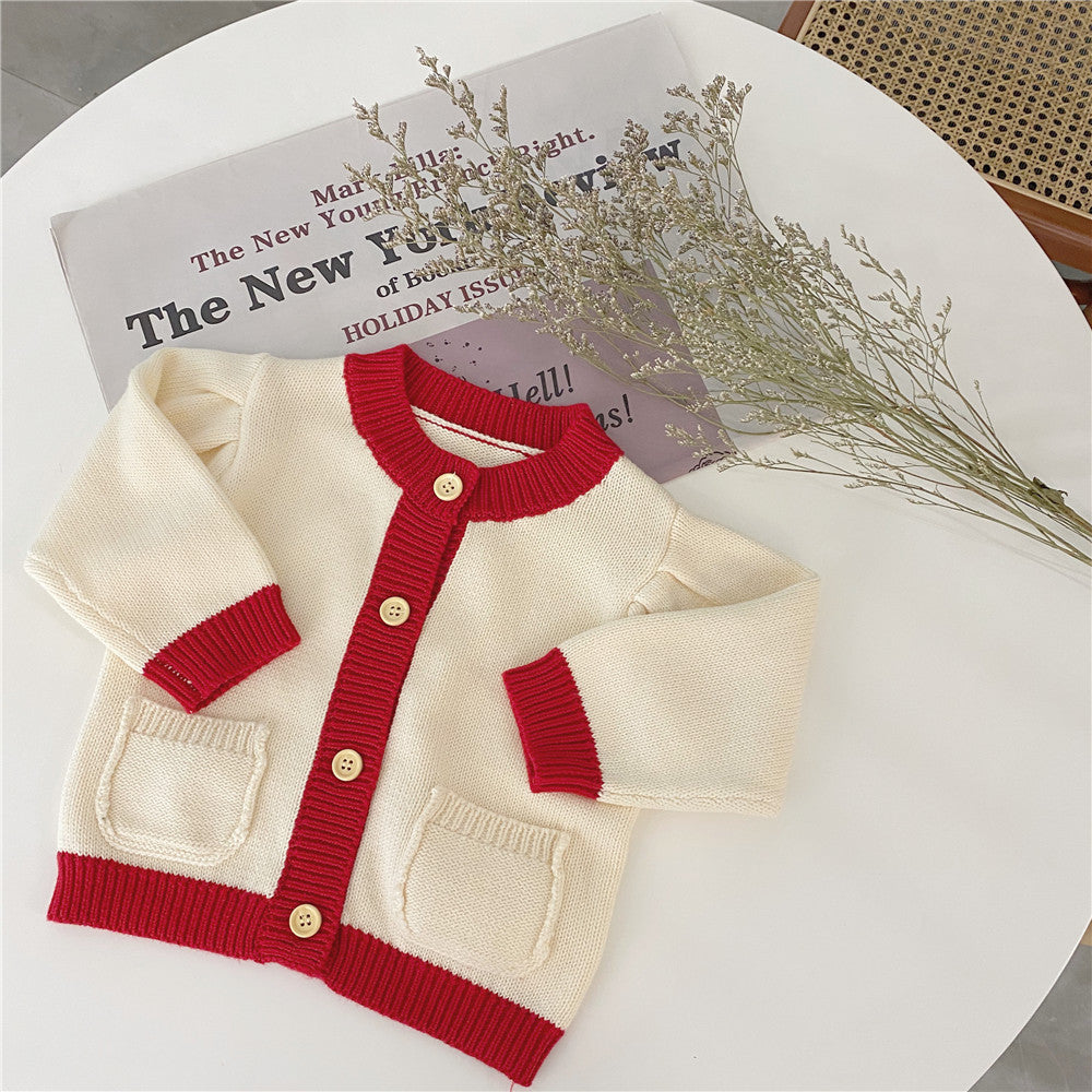 INS spring and autumn baby girl baby infant pocket color matching jacket jacket simple puff sleeve cardigan