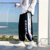 Printing bouquets men's summer loose sports thin trousers Korean version of the trend nine pants play basketball casual pants