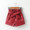 New girls' fashion fashion Korean casual shorts children's fashionable foreign style PU leather shorts tide (with belt)